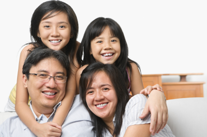 A Picture of Family Happy with our plumbing services. Call us now for a reliale plumber singapore.